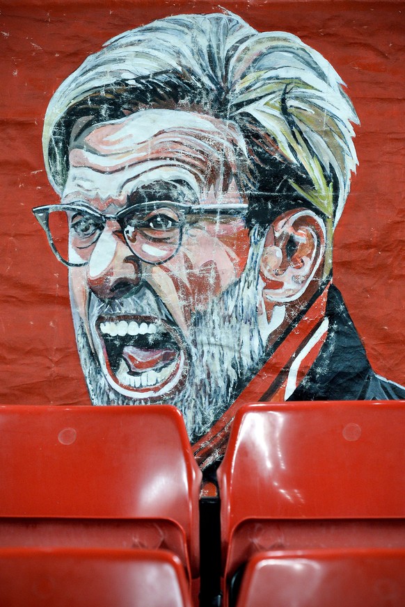 epa07381580 A banner showing Liverpool&#039;s head coach Juergen Klopp is seen prior to the UEFA Champions League round of 16 first leg soccer match between Liverpool FC and FC Bayern Muenchen at the  ...