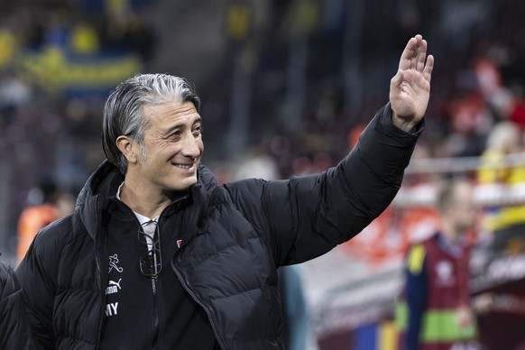 Switzerland&#039;s head coach Murat Yakin waves to the fans, ahead of the FIFA 2026 World Cup Group B qualifying soccer match between Switzerland and Sweden, at the Stade de Geneve stadium, in Geneva, ...