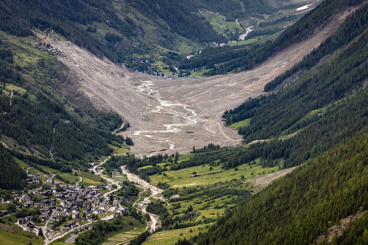 KEYPIX - A general view after a massive avalanche, triggered by the collapse of the Birch Glacier, shows the destruction it caused as it swept down to the valley floor and demolishing the village of B ...