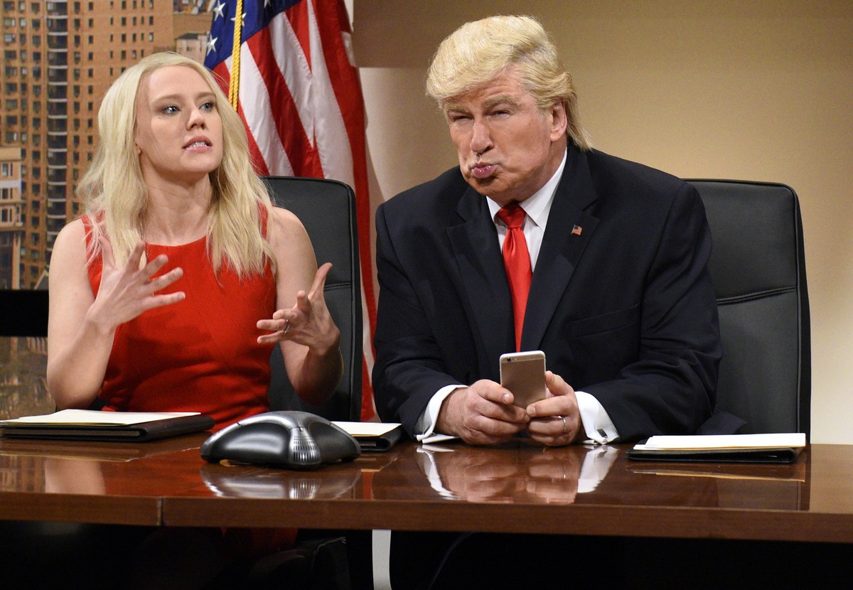 This Dec. 3, 2016 image released by NBC shows Kate McKinnon as Kellyanne Conway, left, and Alec Baldwin as President-elect Donald Trump during "Saturday Night Live," in New York. Trump calle ...