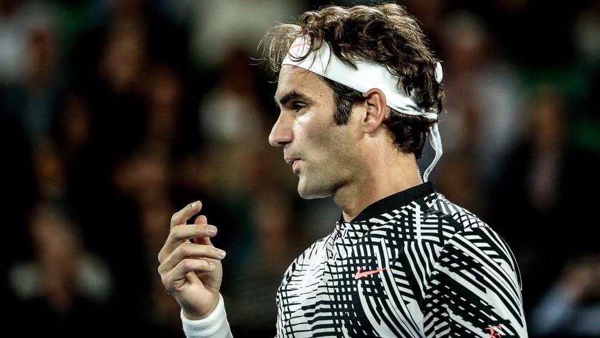 epa05733907 Roger Federer of Switzerland reacts duirng his Men&#039;s Singles third round match against Tomas Berdych of Czech Republic at the Australian Open tennis tournament, in Melbourne, Australi ...