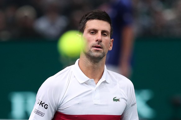 epa09570025 Novak Djokovic of Serbia reacts during the final match against Daniil Medvedev of Russia at the Rolex Paris Masters tennis tournament in Paris, France, 07 November 2021. EPA/CHRISTOPHE PET ...