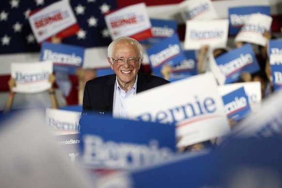 epaselect epa08263418 Democratic presidential candidate Senator Bernie Sanders smiles while speaking to supporters during a rally in San Jose, California, USA, 01 March 2020. Fourteen states, includin ...