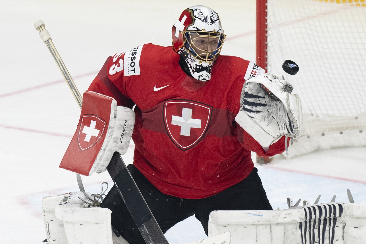 Switzerland's Goalkeeper Leonardo Genoni in action during the Ice Hockey World Championship group A preliminary round match between Switzerland and Canada in Prague at the O2 Arena, Czech Republi ...