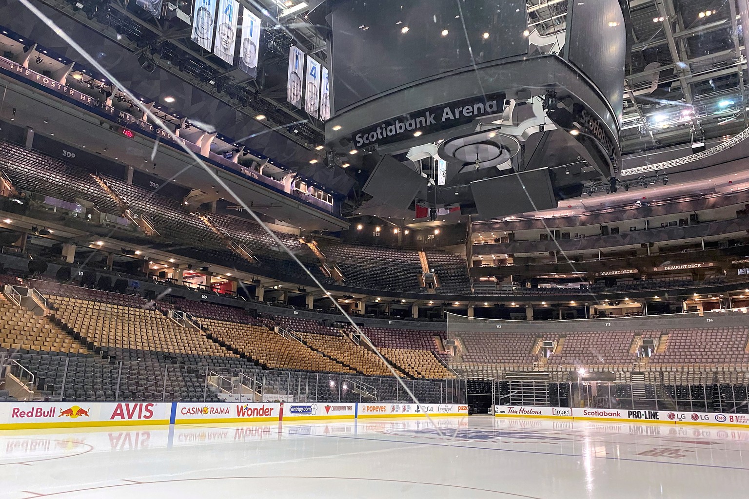 Fresh surfaced ice at Scotiabank Arena, home of the NHL hockey club Toronto Maple Leafs, is shown in Toronto, Thursday, March 12, 2020. The NHL is following the NBAÄôs lead and suspending its season  ...