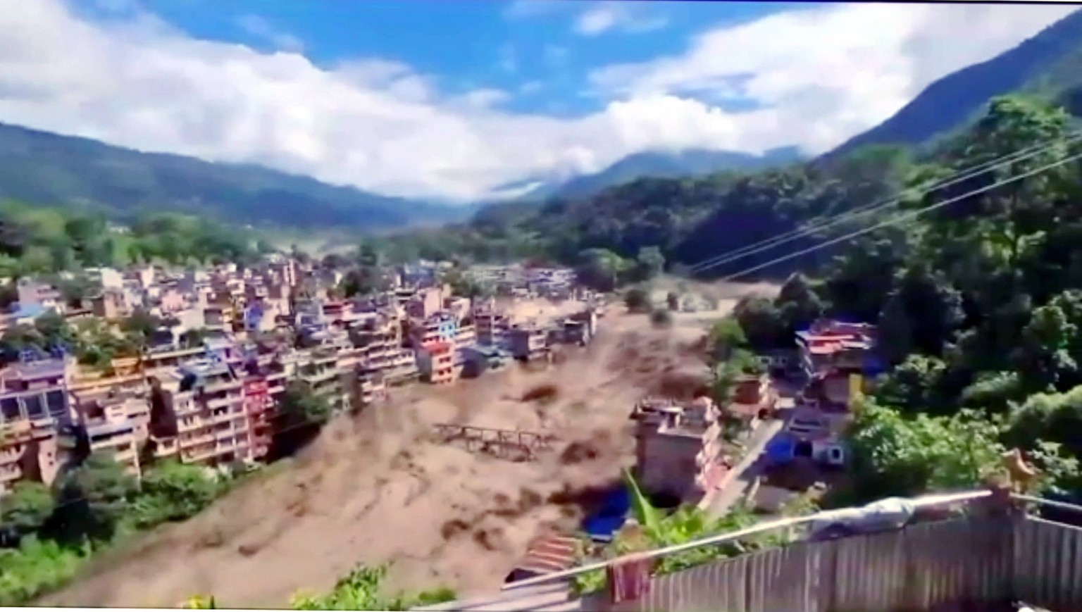 IPA87812146 - Nepal, Floods Between Tibet and Nepal: 95 Dead, Hundreds Missing. The theory: a glacier collapsed. Image/frame distributed by this Agency exclusively for editorial purposes. The material ...