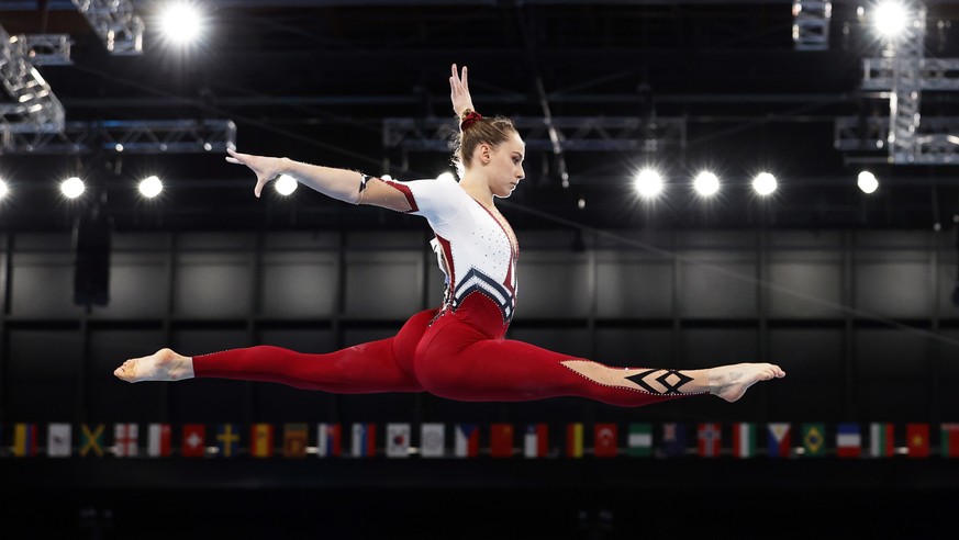 epa09365010 Sarah Voss of Germany competes on the Balance Beam during the Women&#039;s Qualification of the Tokyo 2020 Olympic Games Artistic Gymnastics events at the Ariake Gymnastics Centre in Tokyo ...