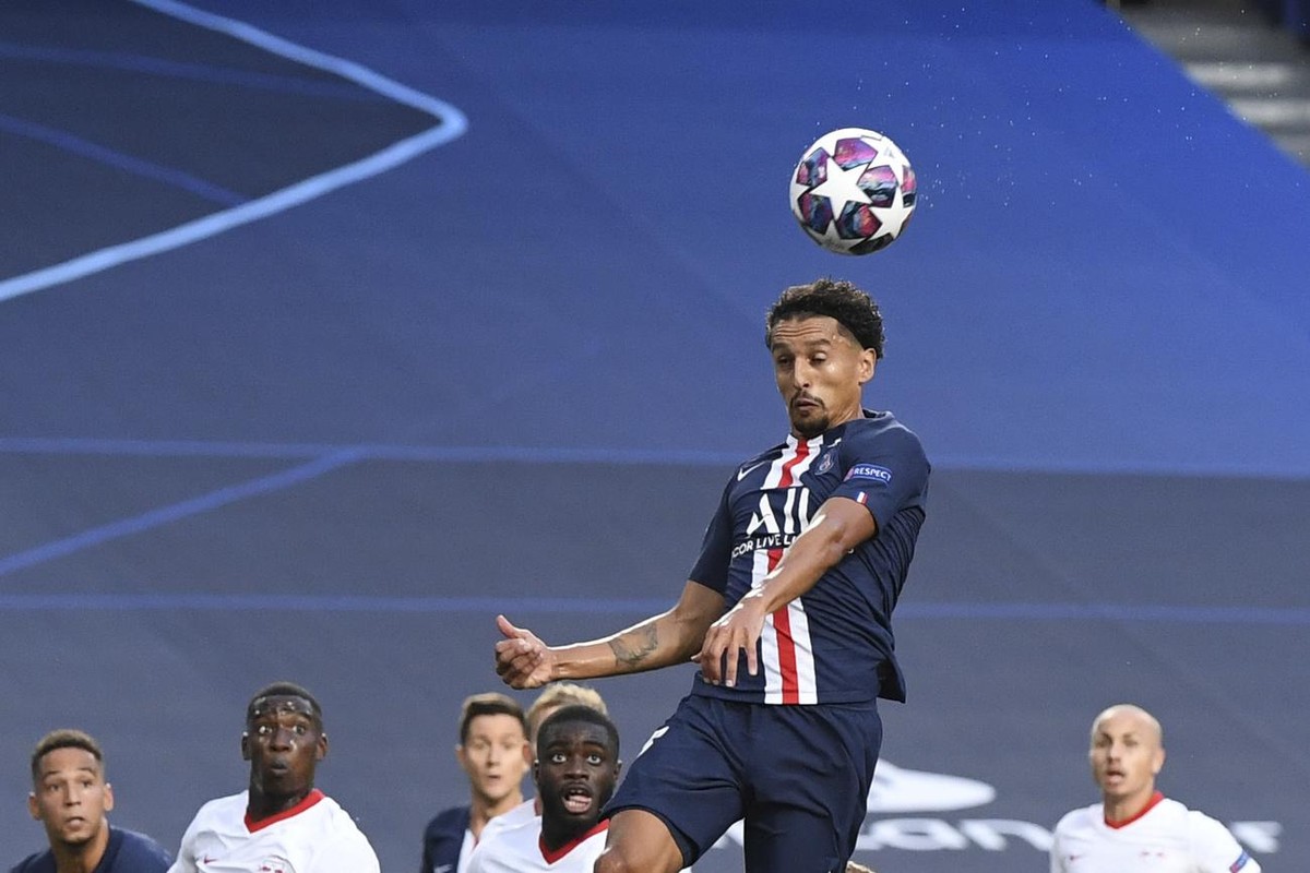 PSG's Marquinhos scores his side's first goal during the Champions League semifinal soccer match between RB Leipzig and Paris Saint-Germain at the Luz stadium in Lisbon, Portugal, Tuesday, A ...