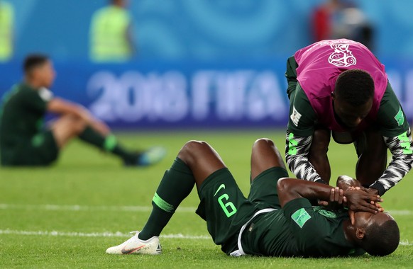 epa06842860 Odion Ighalo (down) of Nigeria reacts after the FIFA World Cup 2018 group D preliminary round soccer match between Nigeria and Argentina in St.Petersburg, Russia, 26 June 2018.

(RESTRIC ...