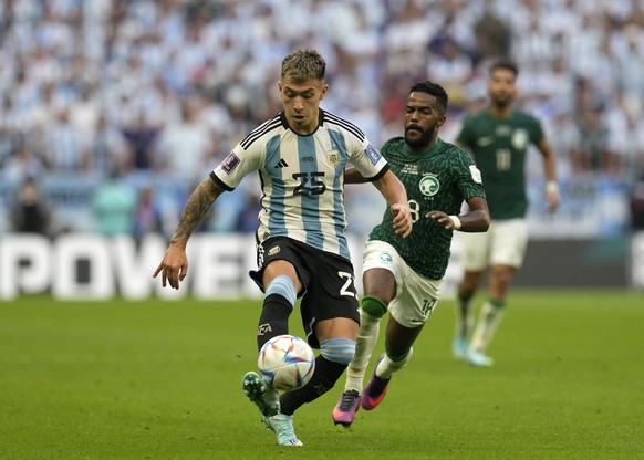 Argentina&#039;s Lisandro Martinez controls the ball during the World Cup group C soccer match between Argentina and Saudi Arabia at the Lusail Stadium in Lusail, Qatar, Tuesday, Nov. 22, 2022. (AP Ph ...