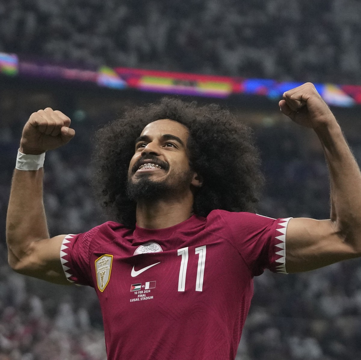 Qatar's Akram Afif celebrates after scoring his second goal during the Asian Cup final soccer match between Qatar and Jordan at the Lusail Stadium in Lusail, Qatar, Saturday, Feb. 10, 2024. (AP P ...