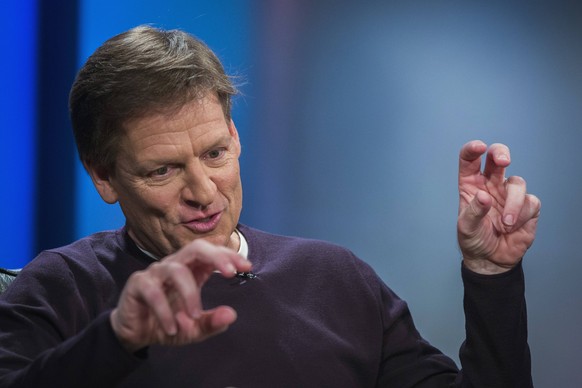 Author Michael Lewis gestures during an interview at Reuters regarding his book about high-frequency trading (HFT) named &quot;Flash Boys: A Wall Street Revolt,&quot; in New York April 3, 2014. REUTER ...