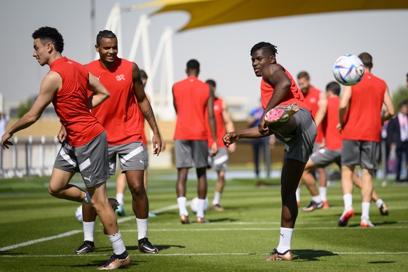 From left Switzerland's midfielder Ruben Vargas, Switzerland's defender Manuel Akanji and Switzerland's forward Breel Embolo attend a closed training session of Swiss national soccer team on the eve o ...