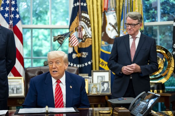 epa12084229 British Ambassador to the United States Peter Mandelson looks on as US President Donald Trump announces a trade agreement between the United States and the United Kingdom in the Oval Offic ...