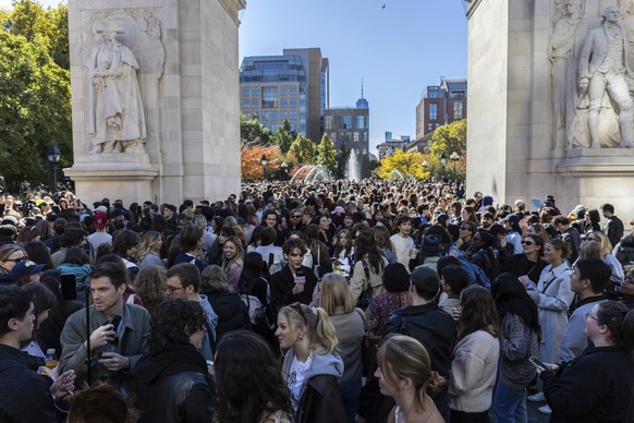 Crowds gather for the Timothee Chalamet lookalike contest in Washington Square Park, Sunday, Oct. 27, 2024, in New York. (AP Photo/Stefan Jeremiah)