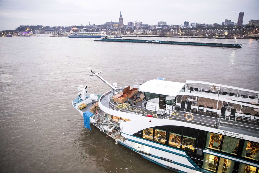 epa07450827 The damage is seen on the MS Edelweiss of the Swiss shipping company Scylla after a collision on river Waal with a cargo ship loaded with cars in Nijmegen, The Netherlands, 20 March 2019.  ...