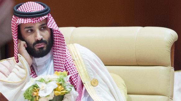 epa06671031 A handout photo made available by the Saudi Press Agency (SPA) shows Saudi Crown Prince Mohammed bin Salman Al Saud (L) attending the 29th Arab Summit, in Dhahran, Saudi Arabia, 15 April 2 ...