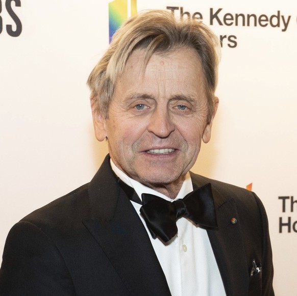 Dancer Mikhail Baryshnikov, right and his wife, Lisa Rinehart, pose on the red carpet at the honors gala for the 44th Annual Kennedy Center Honors, Sunday, Dec. 5, 2021, in Washington. (AP Photo/Kevin ...