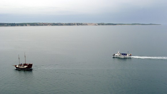 FILE - In this file photo dated May 2005, tourist boats sail in the Piran bay, part of the Adriatic Sea near Portoroz, Slovenia. Croatia and Slovenia failed on Wednesday July 12, 2017, to reach an mut ...