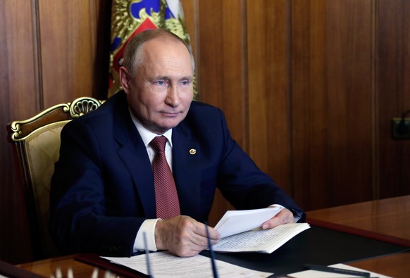 epa09563895 Russian President Vladimir Putin attends a meeting of the Supreme State Council of the Union State of Russia and Belarus via videoconference call in Sevastopol, Crimea, 04 November 2021. V ...