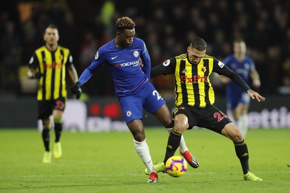 Chelsea&#039;s Callum Hudson-Odoi, left, and Watford&#039;s Jose Holebas, challenge for the ball during the English Premier League soccer match between Watford and Chelsea at Vicarage Road stadium in  ...