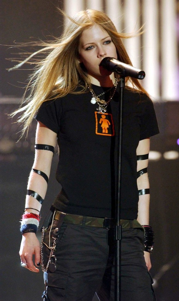 Canadian Avril Lavigne performs during The Brit Awards (British music awards) London, Thursday Feb. 20, 2003. (AP Photo/PA, Myung Jung Kim) ** UNITED KINGDOM OUT MAGAZINES OUT **