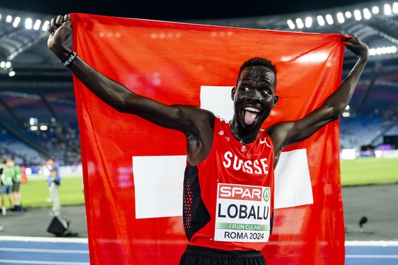 Bronze medalist Dominic Lobalu of Switzerland celebrates during the men&#039;s 5000 meters final at the European Athletics Championships, in the Olympic stadium, in Rome, Italy, Saturday, June 8, 2024 ...