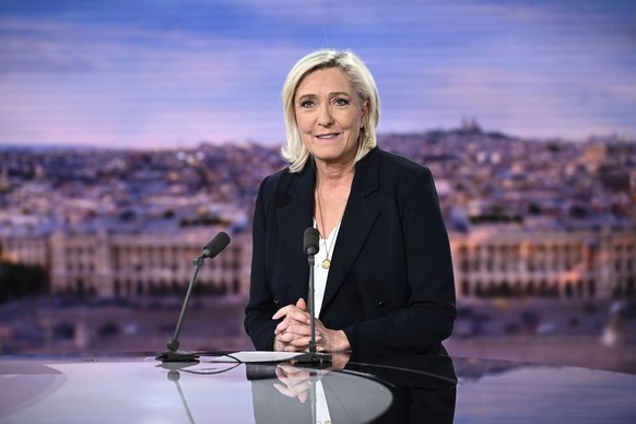 FILE - French far-right National Rally (RN) party leader Marine Le Pen speaks during an interview on French TV channel TF1, in Boulogne-Billancourt, outside Paris, Monday , June 10, 2024. (Julien de R ...