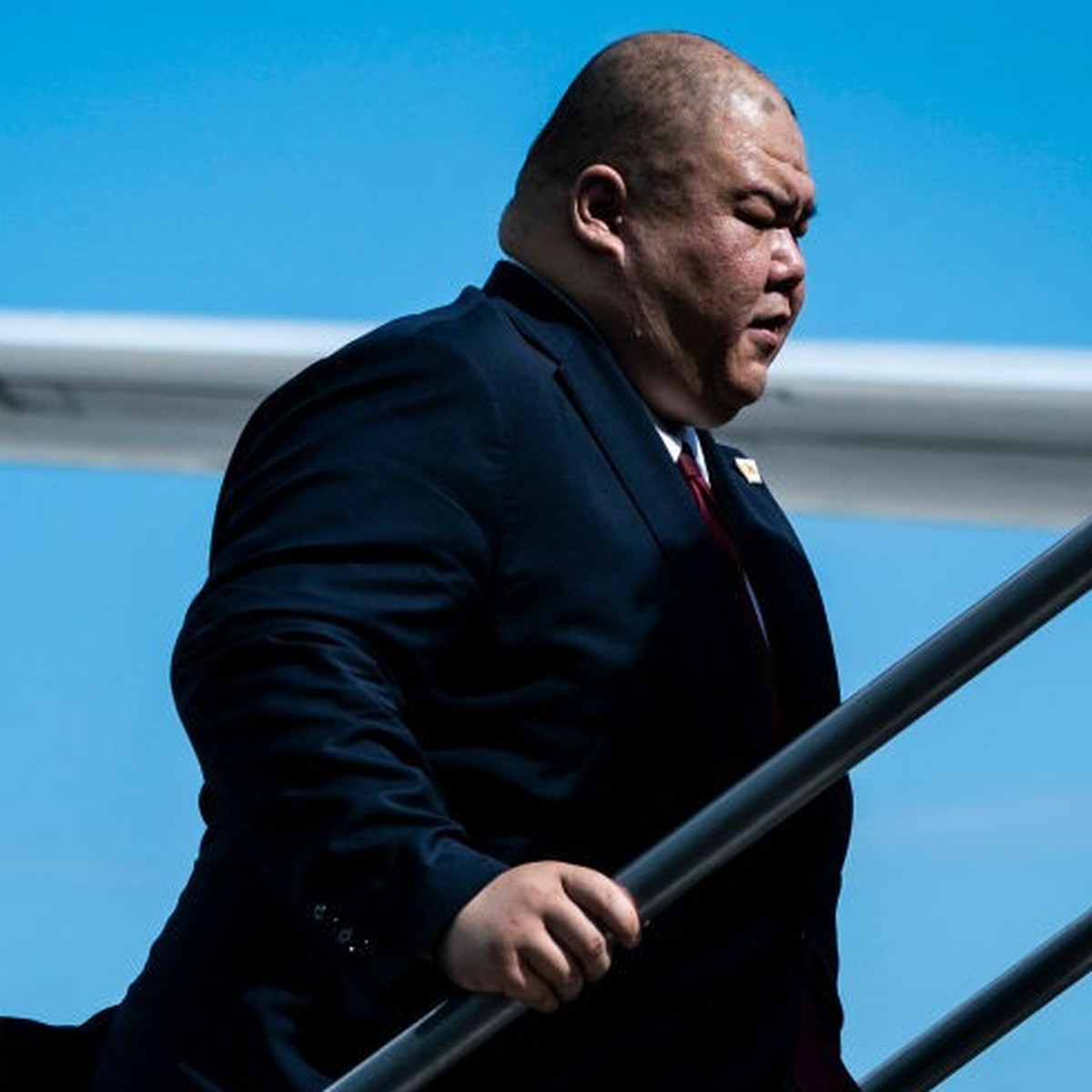 Miami, FL - June 13 : Steven Cheung follows former President Donald Trump as they board his airplane, known as "Trump Force One," to fly back to NJ minutes after Trump pleaded not guilty to  ...