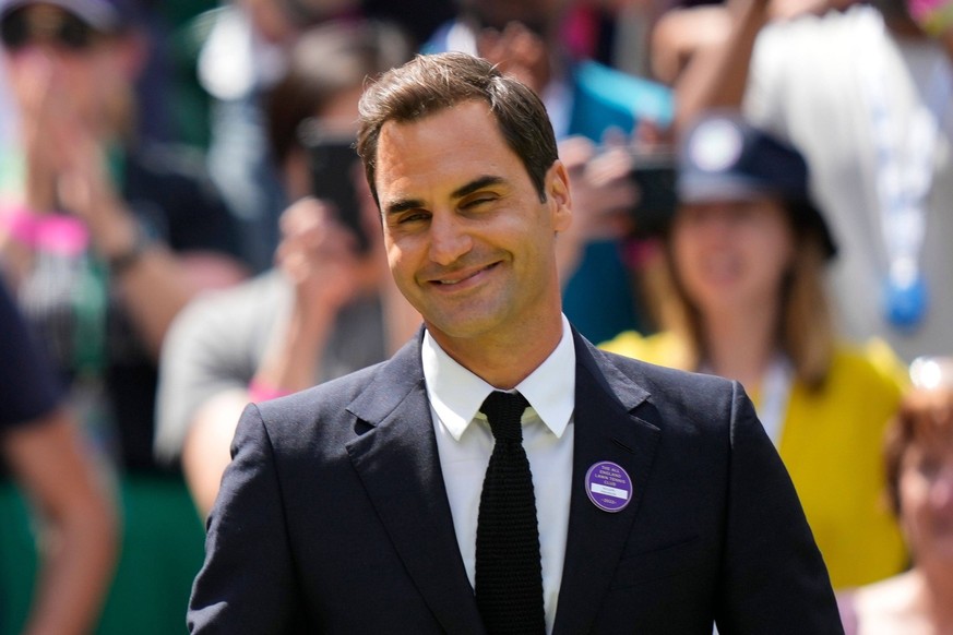 Mandatory Credit: Photo by Dave Shopland/Shutterstock 13012855bz Roger Federer on Centre Court as part of the centenary celebrations Wimbledon Tennis Championships, Day 7, The All England Lawn Tennis  ...
