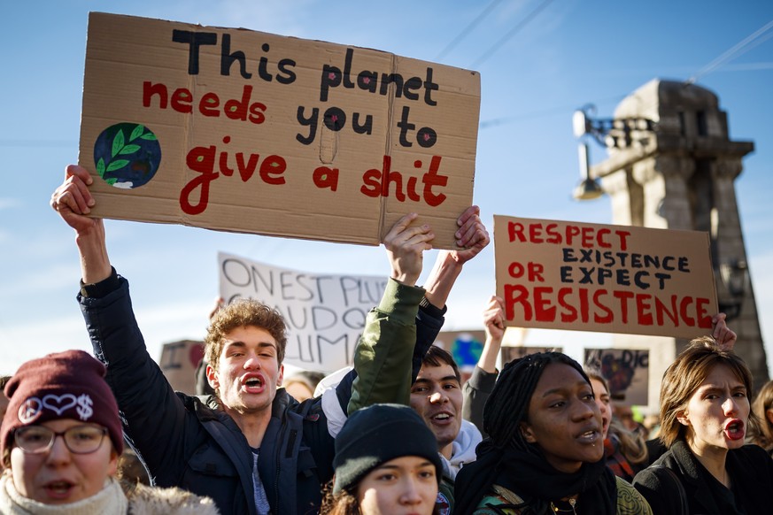 epa07296624 Students protest during a &#039;Youth For Climate&#039; strike urging pupils to skip classes to protest a lack of climate awareness in Lausanne, Switzerland, 18 January 2019. Similar prote ...