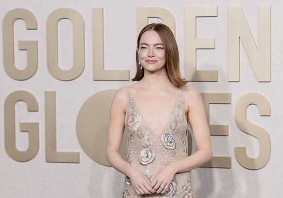 epa11063359 US actor Emma Stone arrives for the 81st annual Golden Globe Awards ceremony at the Beverly Hilton Hotel in Beverly Hills, California, USA, 07 January 2024. Artists in various film and tel ...