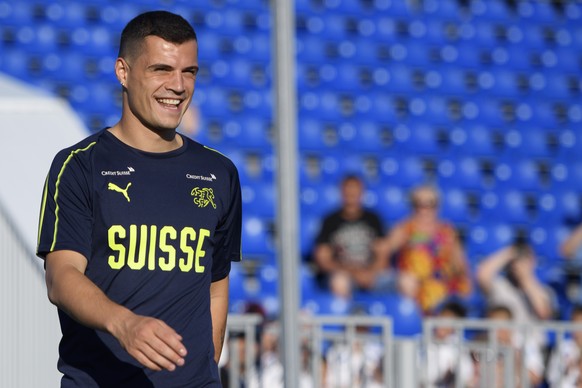 Switzerland's midfielder Granit Xhaka arrives for a training session of the Switzerland's national soccer team at the Torpedo Stadium, in Togliatti, Russia, Saturday, June 23, 2018. The Swis ...