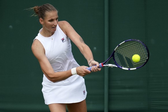 Czech Republic&#039;s Karolina Pliskova plays a return to Czech Republic&#039;s Tereza Martincova during the women&#039;s singles third round match on day five of the Wimbledon Tennis Championships in ...