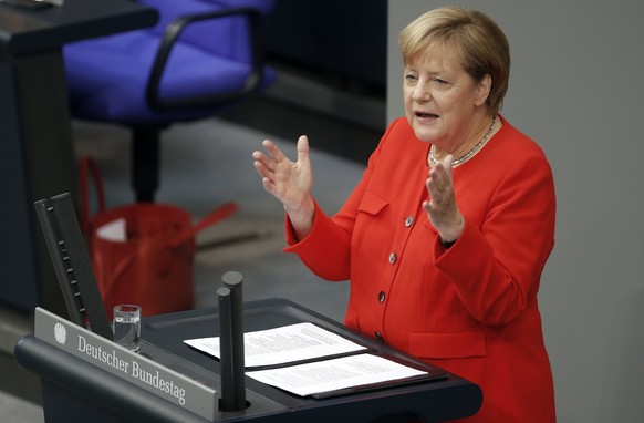 epa06184666 German Chancellor Angela Merkel delivers a speech to the German Bundestag in Berlin, Germany, 05 September 2017. The German lower house, the Bundestag convenes for its last session of the  ...