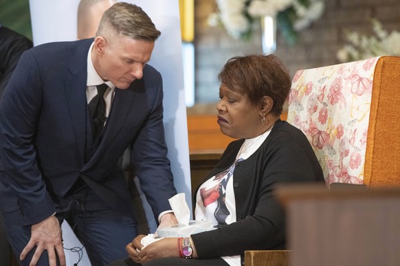 Jayland Walker family attorney Bobby DiCello speaks with Pamela Walker, Jayland Walker&#039;s mother, during a media briefing Monday, April 17, 2023, at St. Ashworth Temple in Akron, Ohio, after a gra ...