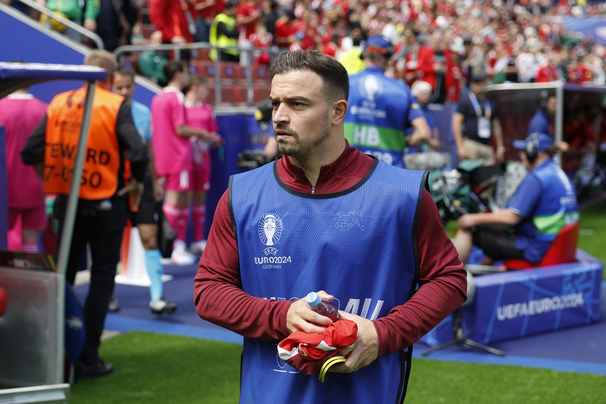 Switzerland's Xherdan Shaqiri walks to the bench prior to a Group A match between Hungary and Switzerland at the Euro 2024 soccer tournament in Cologne, Germany, Saturday, June 15, 2024. (KEYSTON ...