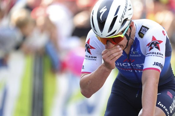 Belgium's Remco Evenepoel of the Quickstep Alpha Vinyl team reacts as he crosses the finish line to win the Belgian cycling classic and UCI World Tour cycling race Liege Bastogne Liege, in Liege, Belgium, Sunday, April 24, 2022. (AP Photo/Olivier Matthys)
Tadej Pogacar,Primoz Roglic,Julian Alaphilippe
