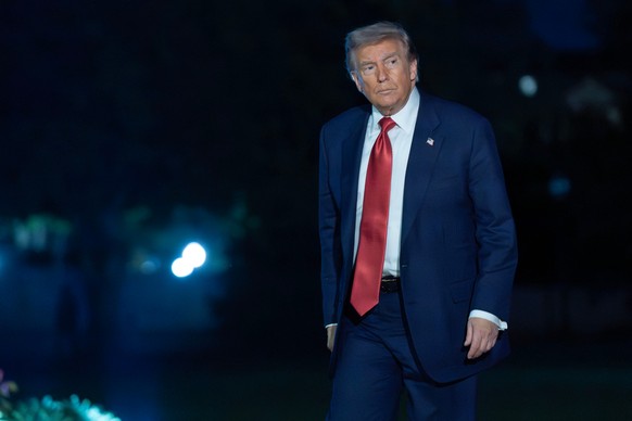 President Donald Trump walks on the South Lawn upon his arrival to the White House, Friday, May 8, 2026, in Washington. (AP Photo/Jose Luis Magana)
Donald Trump