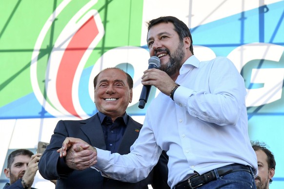 epa07934237 (L-R) Leader of Forza Italia party, Silvio Berlusconi, and the Secretary of League party Matteo Salvini during the anti-government rally called by the League party in Rome, Italy, 19 Octob ...