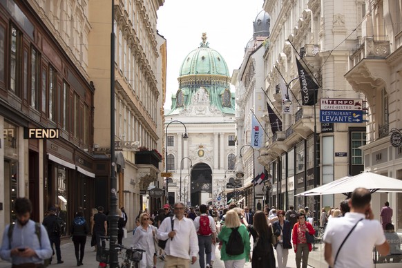 People walk on the shopping street Kohlmarkt in Vienna, Austria, Tuesday, June 14, 2022. The Austrian government presented a package of measures aimed at cushioning the impact of high inflation that i ...