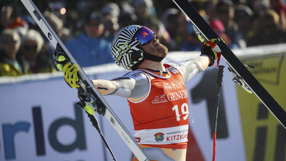 Norway's Kjetil Jansrud celebrates at the finish area during an alpine ski, men's World Cup super G, in Kitzbuehel, Austria, Friday, Jan. 24, 2020. (AP Photo/Marco Trovati)