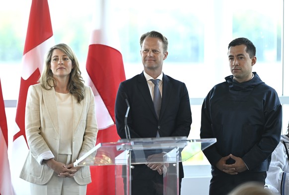 Canadian Foreign Minister Mélanie Joly, left, Danish Foreign Minister Jeppe Kofod, center, and Greenland Prime Minister Mute Bourup Egede, right, prepare for a question and answer period after a signi ...