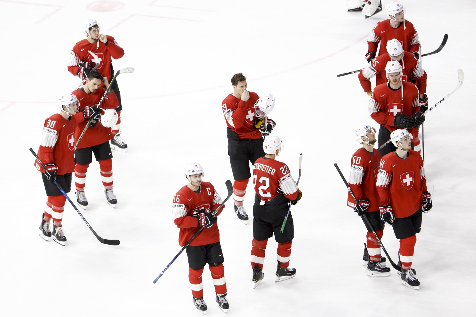 Switzerland&#039;s players look disappointed after losing against Sweden, during the IIHF 2018 World Championship preliminary round game between Switzerland and Sweden, at the Royal Arena, in Copenhag ...