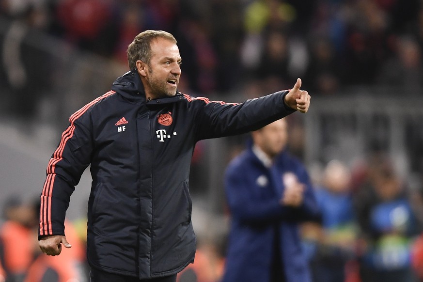 epa07976899 Bayern&#039;s interim coach Hansi Flick reacts during the UEFA Champions League group B soccer match between Bayern Munich? and Olympiacos Piraeus at the Allianz Arena in Munich, Germany,  ...