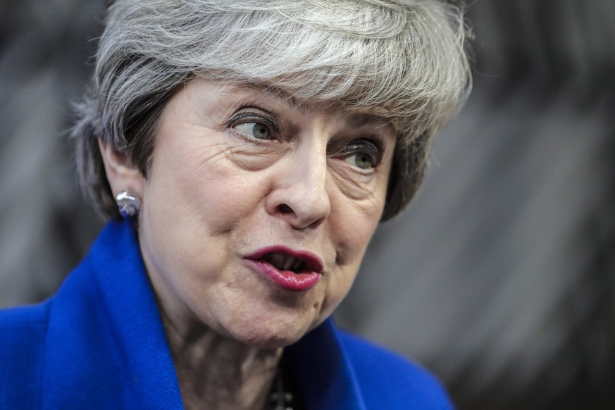 epa07496557 British Prime Minister Theresa May speaks to media as she arrives for a special EU summit on Brexit at the European Council in Brussels, Belgium, 10 April 2019. EU leaders gathered for an  ...