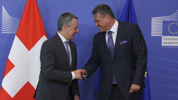 epa10752873 Swiss Federal Councillor for Foreign Affairs Ignazio Cassis (L) meets with Vice President of the European Commission Maros Sefcovic (R) at the EU Commission in Brussels, Belgium, 18 July 2 ...