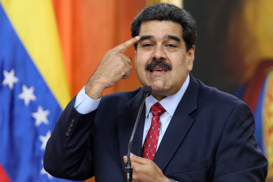 epa07319584 Venezuelan president, Nicolas Maduro, speaks during a press conference from Miraflores Palace, in Caracas, Venezuela, 25 January 2019. Maduro said that the international media that have co ...