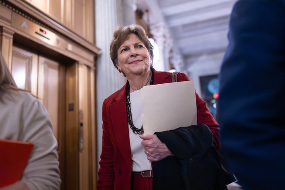 Sen. Jeanne Shaheen, D-N.H., arrives at the chamber as the Senate works to bring the longest government shutdown in U.S. history to an end after a bipartisan compromise, at the Capitol in Washington,  ...