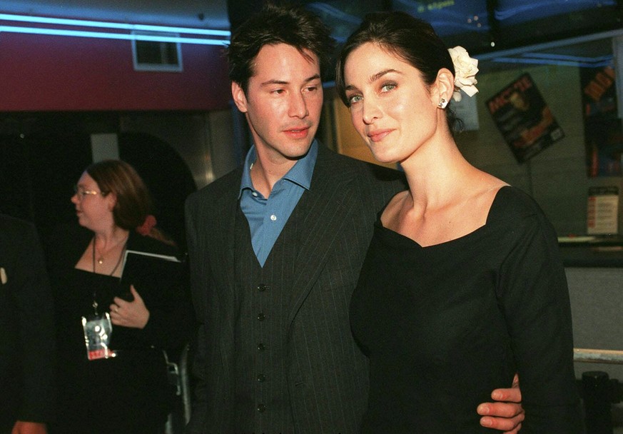 April 1999 - Keanu Reeves and Carrie Anne Moss attend the Australian Premiere of The Matrix in Sydney, Australia. (Photo by Patrick Riviere)